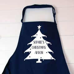 a personalised Christmas apron in navy blue