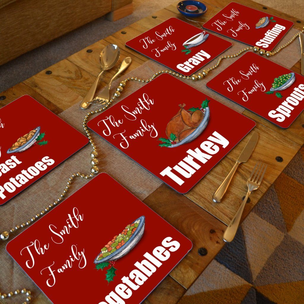 personalised Christmas placemats on a wooden table 